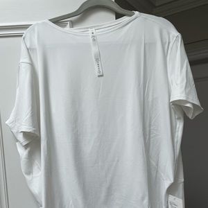 NWT Lululemon “Back in Action” , Nulu, short sleeve , size 8